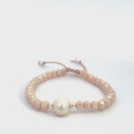 Load and play video in Gallery viewer, Peach Shimmer Crystal Bracelet | Pearl Crystal Collection
