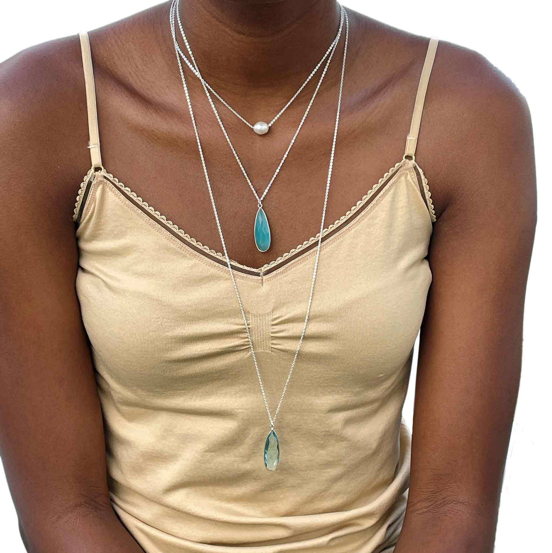 How to layer necklaces without tangling. Prevent tangles by layering different lengths.