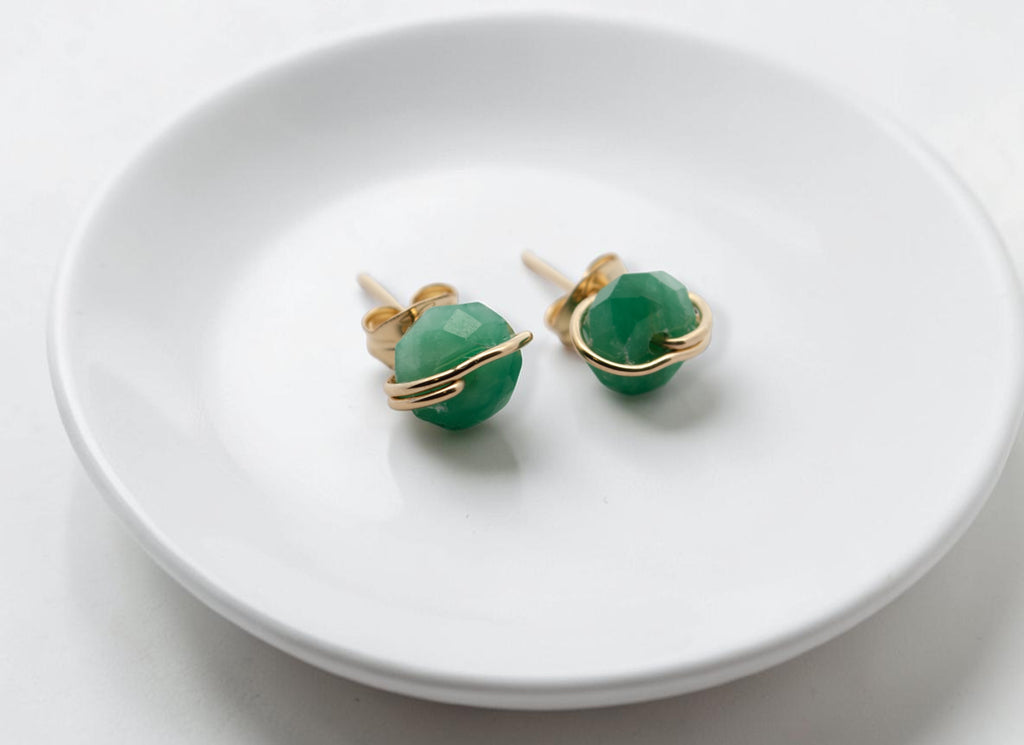 emerald stud in dish