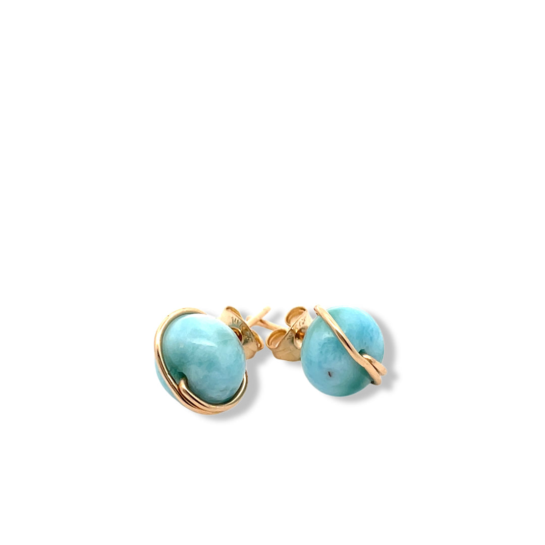 Larimar earrings with gold posts on a white background 