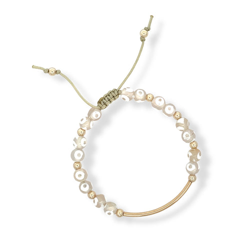 Neutral agate bracelet with 14K gold-filled curved bar and beige cord, hand-strung with natural white-accented gemstones