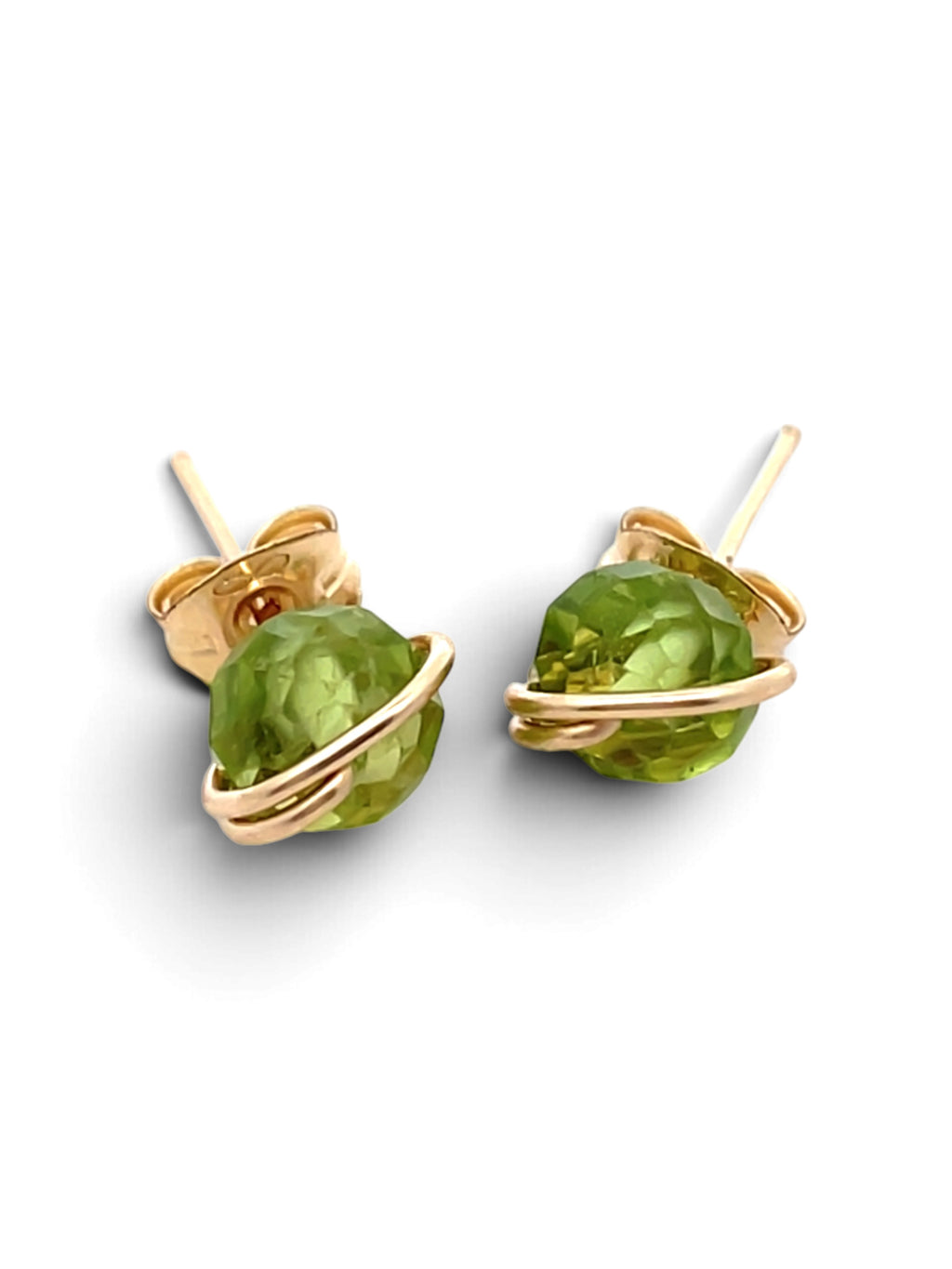 A pair of gold stud earrings featuring faceted green gemstone beads wrapped in twisted gold wire, shown on a clean white background.