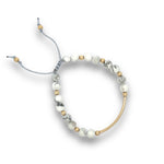 Load image into Gallery viewer, White howlite bracelet in gold 
