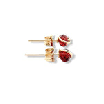 Load image into Gallery viewer, Gold earrings with red gemstones on a white background
