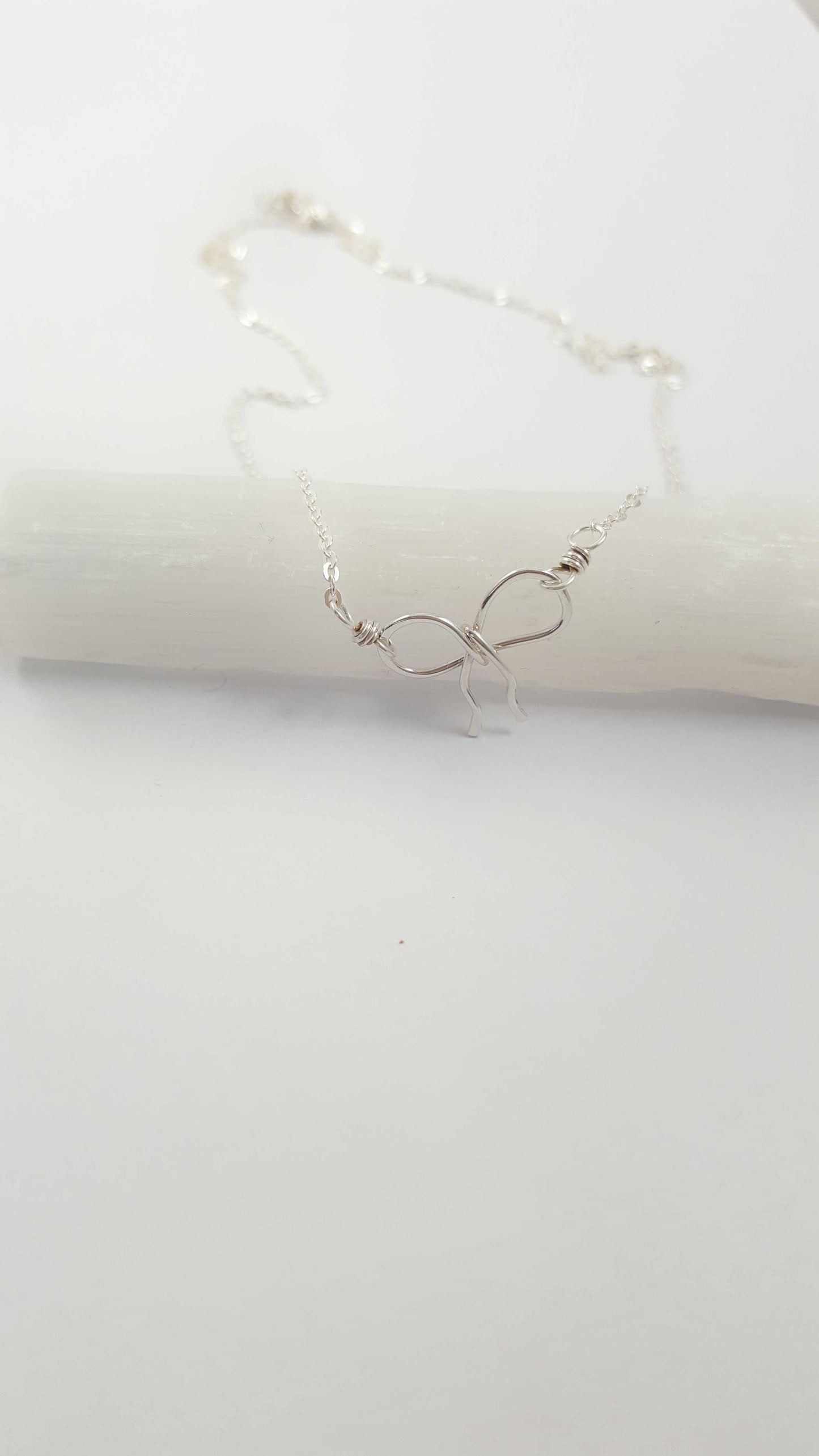 silver bow necklace 