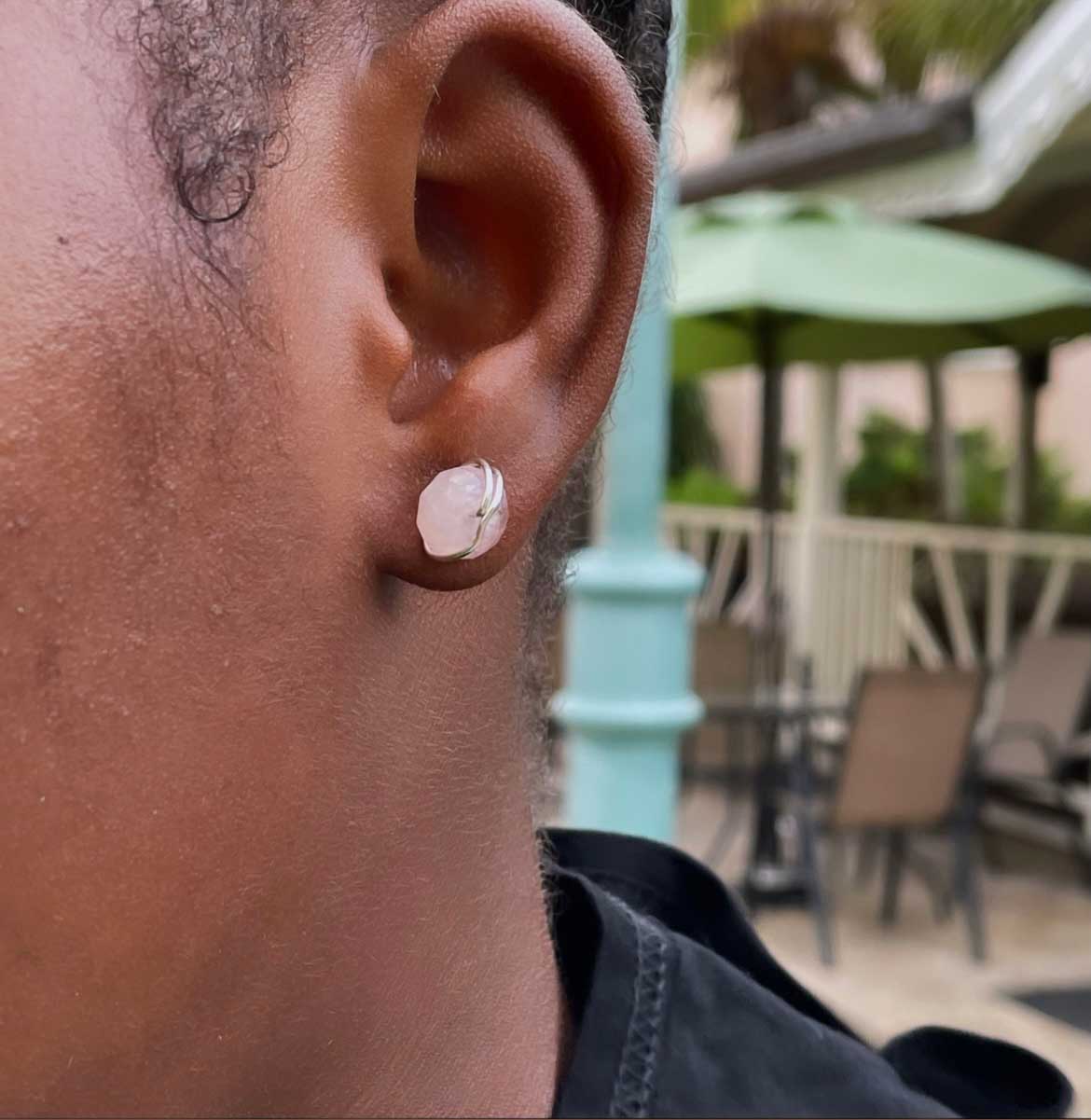 model in rose quartz stud earrings 