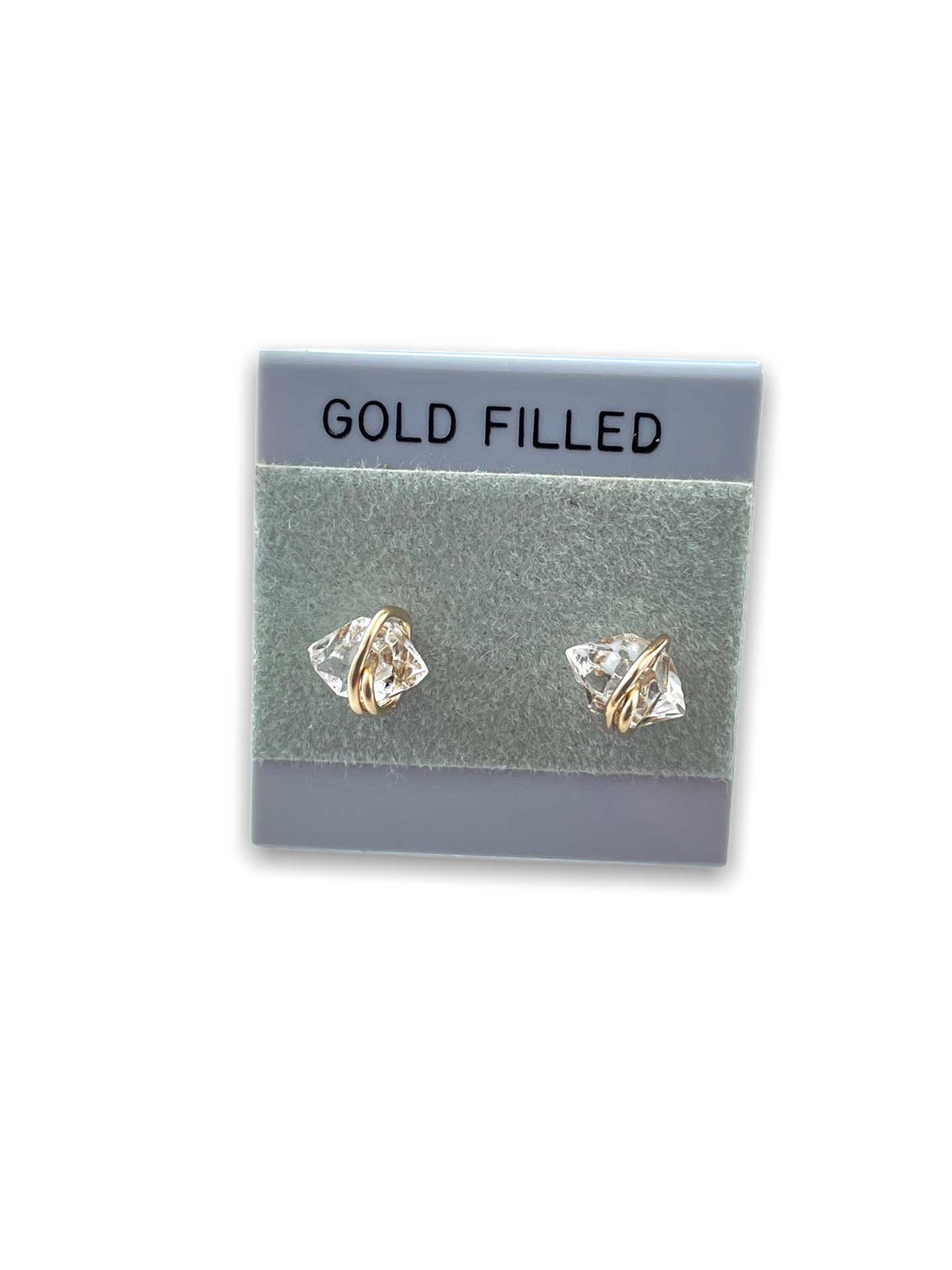 clear quartz stud earring on  gold-filled card 